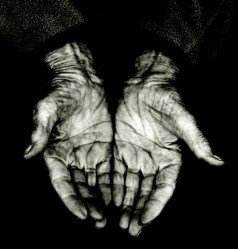 palms of a elderly woman, isolated on black copyspace, grain added